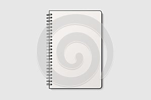 Real photo, spiral bound notepad mockup template with black paper cover, isolated on light grey background.