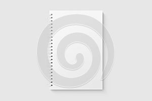 Real photo, spiral bound notepad mockup template with paper cover, isolated on light grey background.