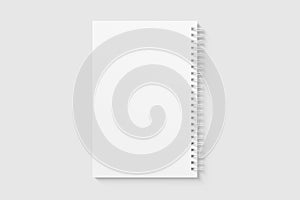 Real photo, spiral bound notepad mockup template with paper cover, isolated on light grey background.