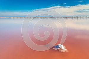 Real pink color salt lake and deep blue sky, minimalistic landscape