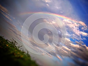 Real Rainbow with clouds captured on rainyday in mobile