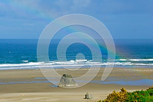 Real rainbow over a Pacific Northwest USA beach