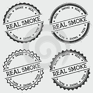 Real smoke insignia stamp isolated on white.