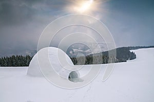 Real snow igloo under sunlight