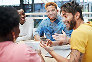 Real teamwork gets real results. a group of young businesspeople having a meeting in a modern office.