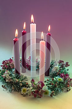 real traditional christian religious advent wreath with 5 candles, 5 candles burning