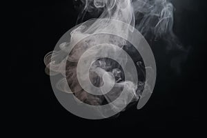 Real white smoke on black background