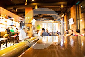 Real wood table with light reflection on scene at restaurant, pu