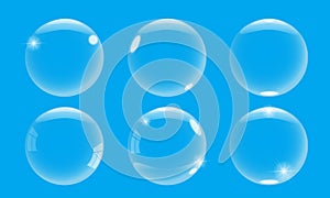 Realistic 3d soap bubble with on blue background. Vector Soap Bubble set illustration.