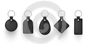 Realistic black leather keychains with metal ring vector illustration. Set of holder trinket to key