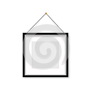 Realistic black photo frame hanging on the wall. Vector