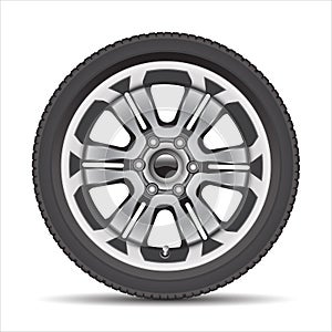 Realistic car wheel alloy with black rubber on white background vector