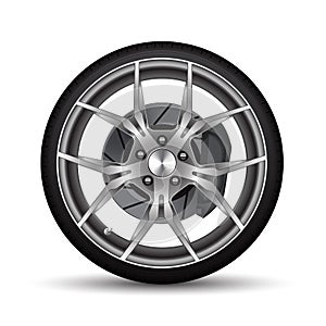 Realistic car wheel alloy black tire with disk brake on white background vector