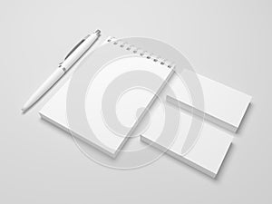 Realistic 3d illustration spiral notepad with pen and business cards.