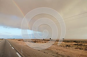 realistic desert rainbow