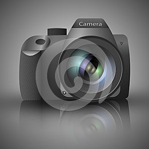 Realistic digital camera with lens on grey background.Vector illustration