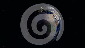 Realistic Earth rotating in space loop. On the planet Earth is visible the change of day and night