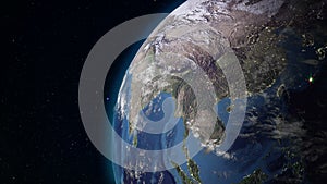 Realistic Earth rotating in space loop. On the planet Earth is visible the change of day and night