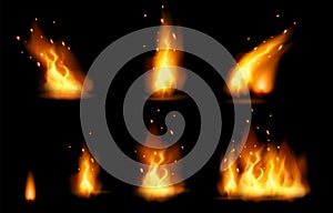 Realistic fire flame and sparks set with different shapes isolated on black background.