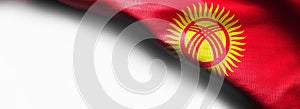 Realistic flag of Kyrgyzstan on white background - right top corner flag