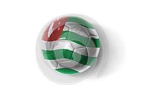Realistic football ball with colorfull national flag of abkhazia on the white background