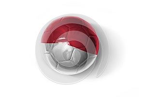 Realistic football ball with colorfull national flag of indonesia on the white background