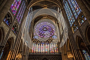 Gothic cathedral window with stained glass photo