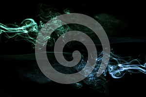 Realistic green blue smoke black background . High quality and resolution beautiful photo concept