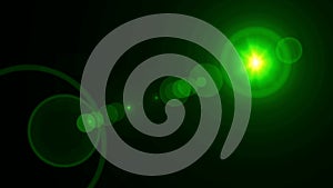 Realistic green light Lens flare on black background.