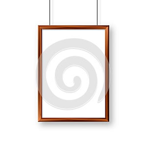 Realistic hanging on a wall blank wooden picture frame. Modern poster mockup. Empty photo frame with texture of wood