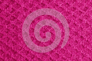 Realistic illustration of a lilac-pink knitted carpet close-up. Textile texture on a lilac-pink background. Detailed warm yarn