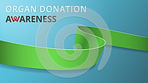 Realistic lime green ribbon. Awareness organ donation month poster. Vector illustration. World organ donation day photo