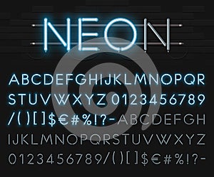 Realistic neon alphabet on a background of black brick wall. Blue glowing font. Vector format