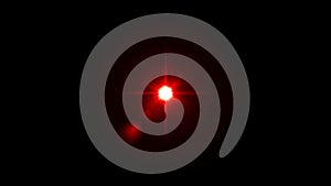 Realistic red light Lens flare on black background.