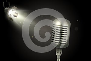 Realistic retro microphone and spotligh on dark background