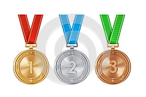 Realistic set of golden, silver, and bronze medals on colorful ribbons. Sports competition awards for 1st, 2nd, and 3rd place.