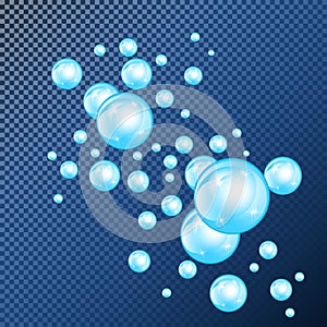 Realistic soap bubbles with rainbow reflection set isolated on the blue transparent background. vector Illustration