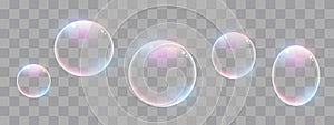 Realistic soap bubbles with rainbow reflection set isolated