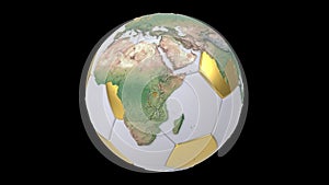 Realistic soccer ball isolated on black screen. 3d seamless looping animation. Detailed world map on white and gold soccer ball.