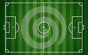 Realistic soccer field background top view with grass texture