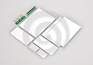 Realistic Stationery Mockups Set. Letterhead, name card, envelope, presentation folder.