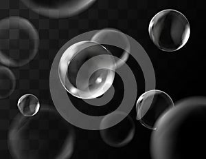 Realistic transparent soap bubbles with reflection. Isolated set composition.