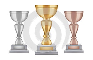 Realistic trophy. Gold silver bronze award cups collection. Vector shine trophies isolated on white background