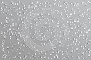 Realistic water droplets on a black background. Vector illustration.