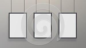 Realistic white poster mockup with black frame. Blank empty vertical A4 formats paper poster at the grey wall. Vector photo