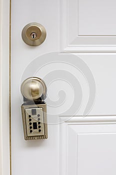 Realtor Lock on White Door