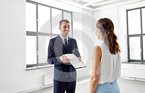 Realtor showing contract document to customer