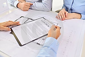 Realtor showing contract document to customers