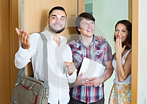 Realtor showing new apartment to merried couple