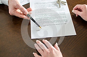 Realtor showing the signature place of a contract